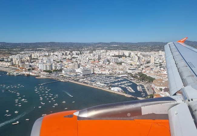 The flight path into Faro Airport flies over the city of Faro